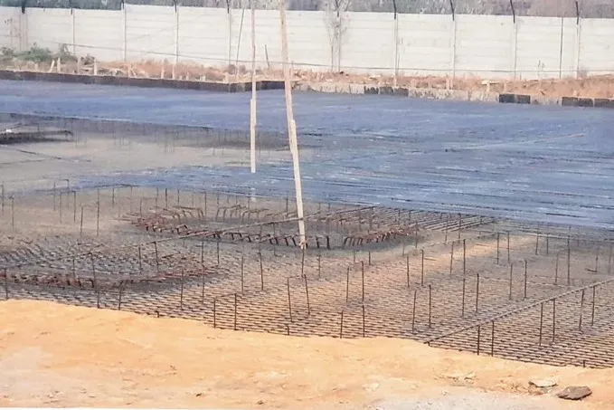 Rebar mat laid ahead of a raft foundation pour