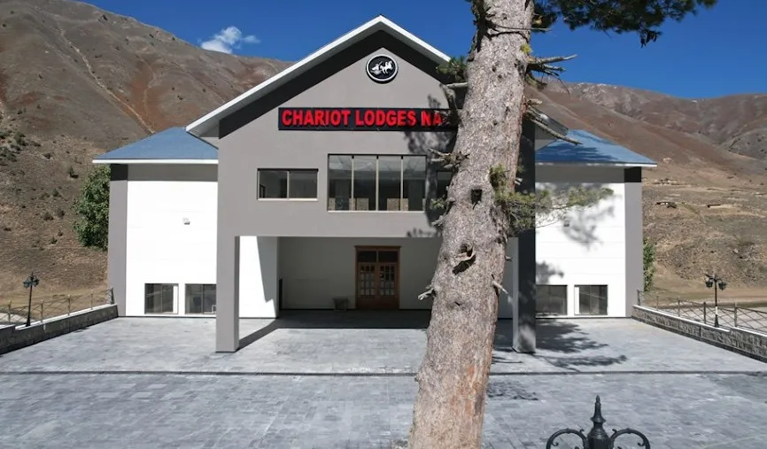Front entrance and paved forecourt of the lodges at Naran