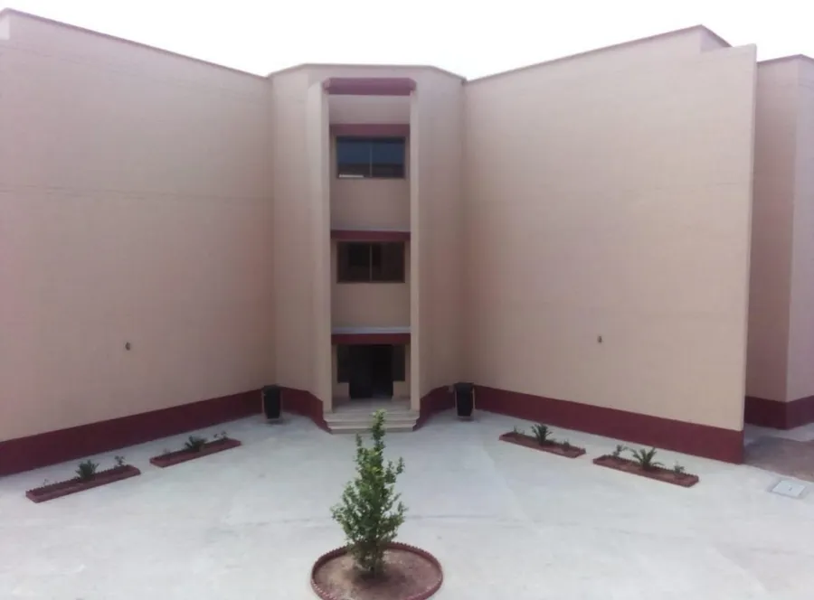 Completed residential block with landscaped courtyard