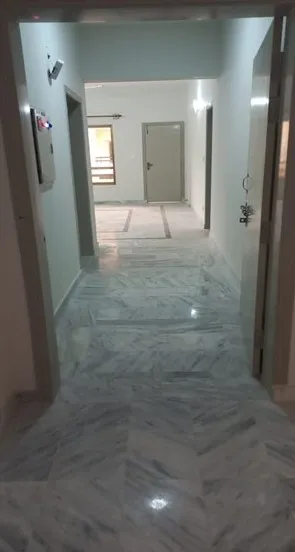 Corridor with marble flooring